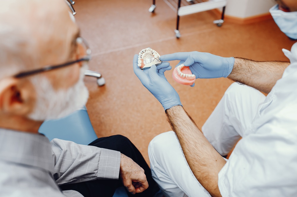 dentist explaning about dental bridges